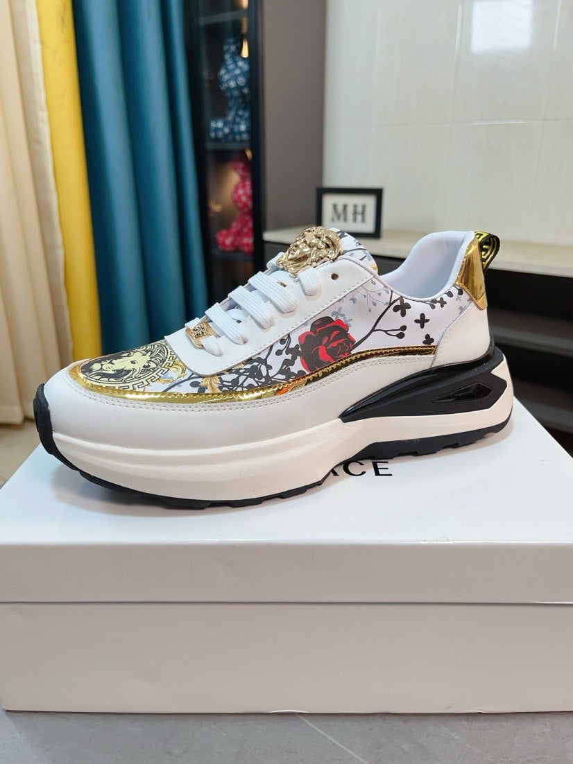 Versace sneakers with white upper, colorful logo print panel, gold trim, lace-up