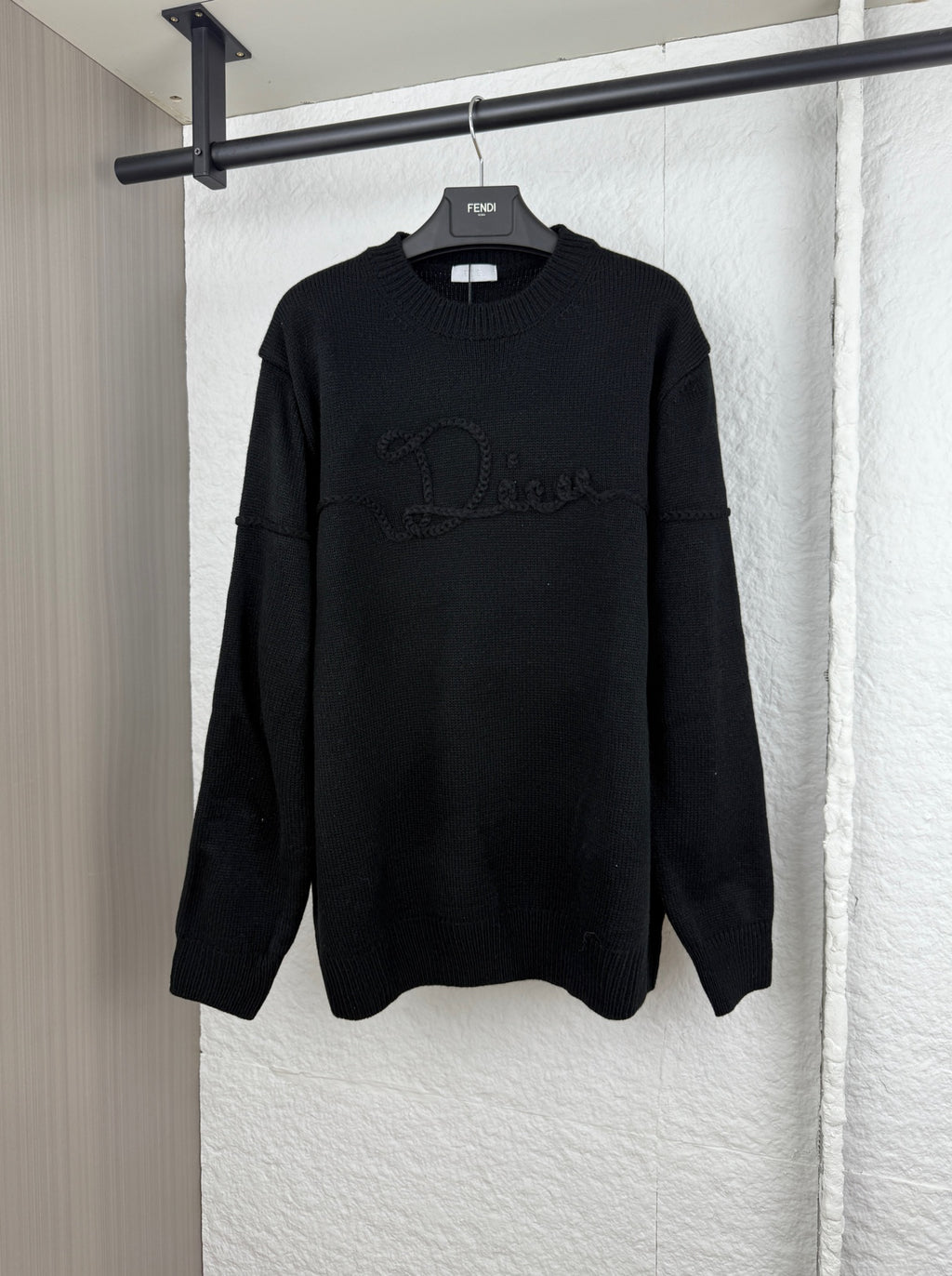Dior long-sleeve knit sweater in black with front logo graphic