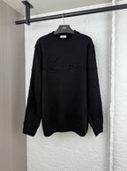 Dior long-sleeve knit sweater in black with front logo graphic