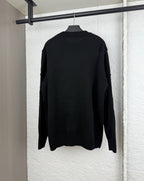 Dior long-sleeve knit sweater in black, back view with ribbed crew neckline