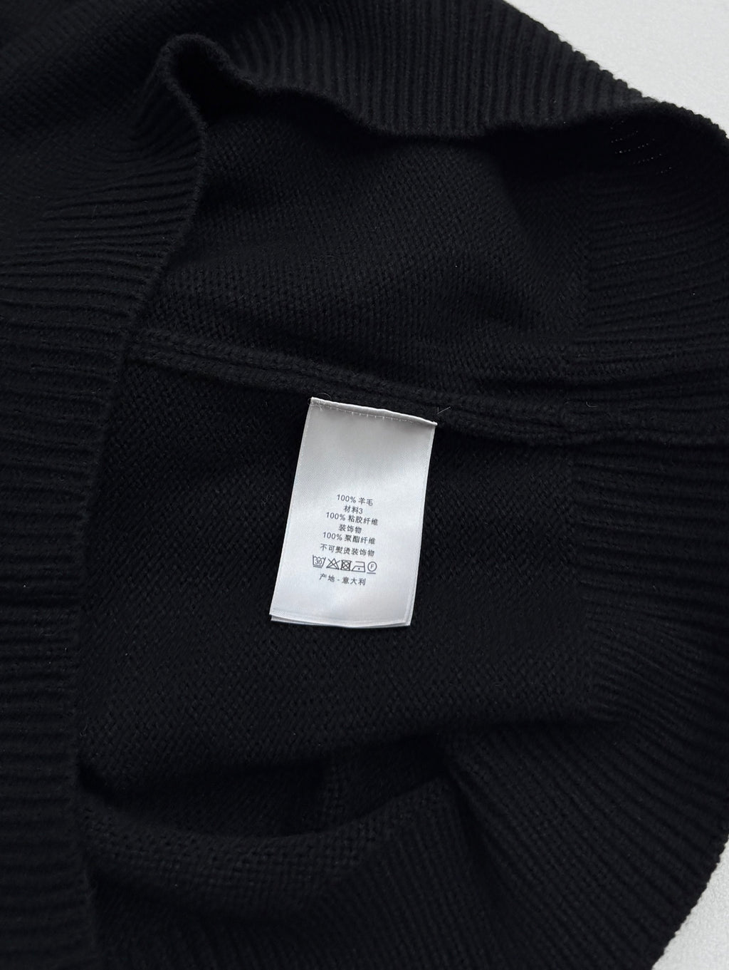 Dior black knit sweater neck label with ribbed knit collar