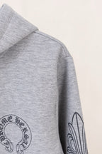 Grey hoodie with hood and side sleeve graphic print.