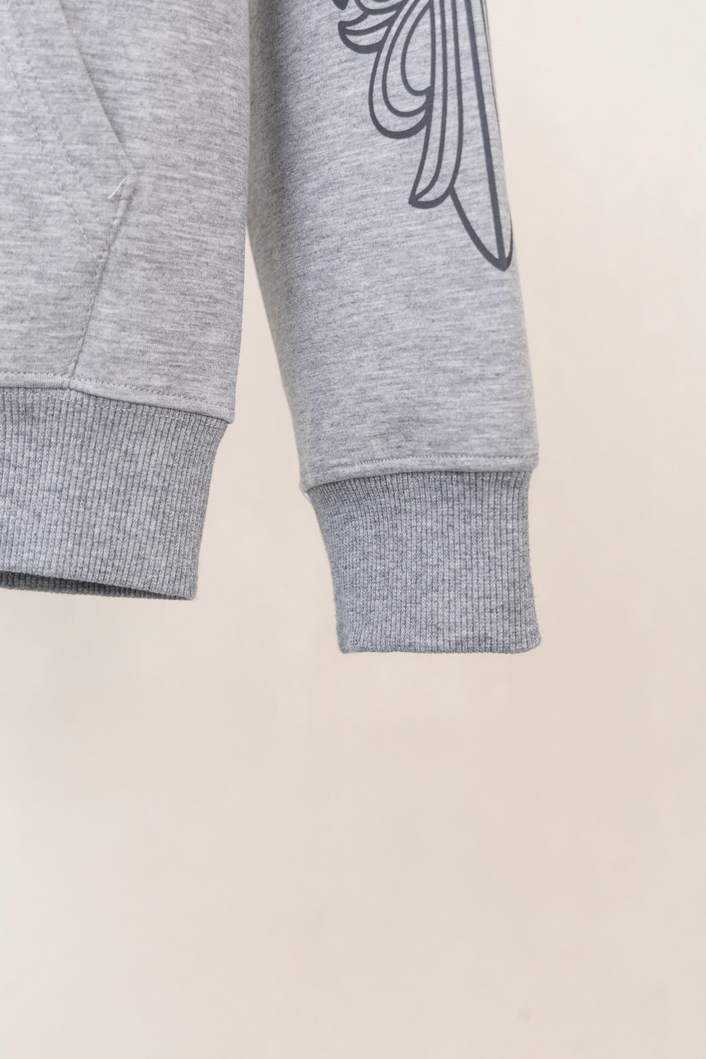 Heather gray zip-up hoodie sleeve cuff and hem