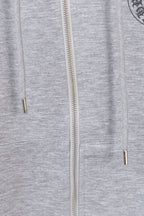 Grey zip hoodie with centered zipper and metal zipper pull at chest level.