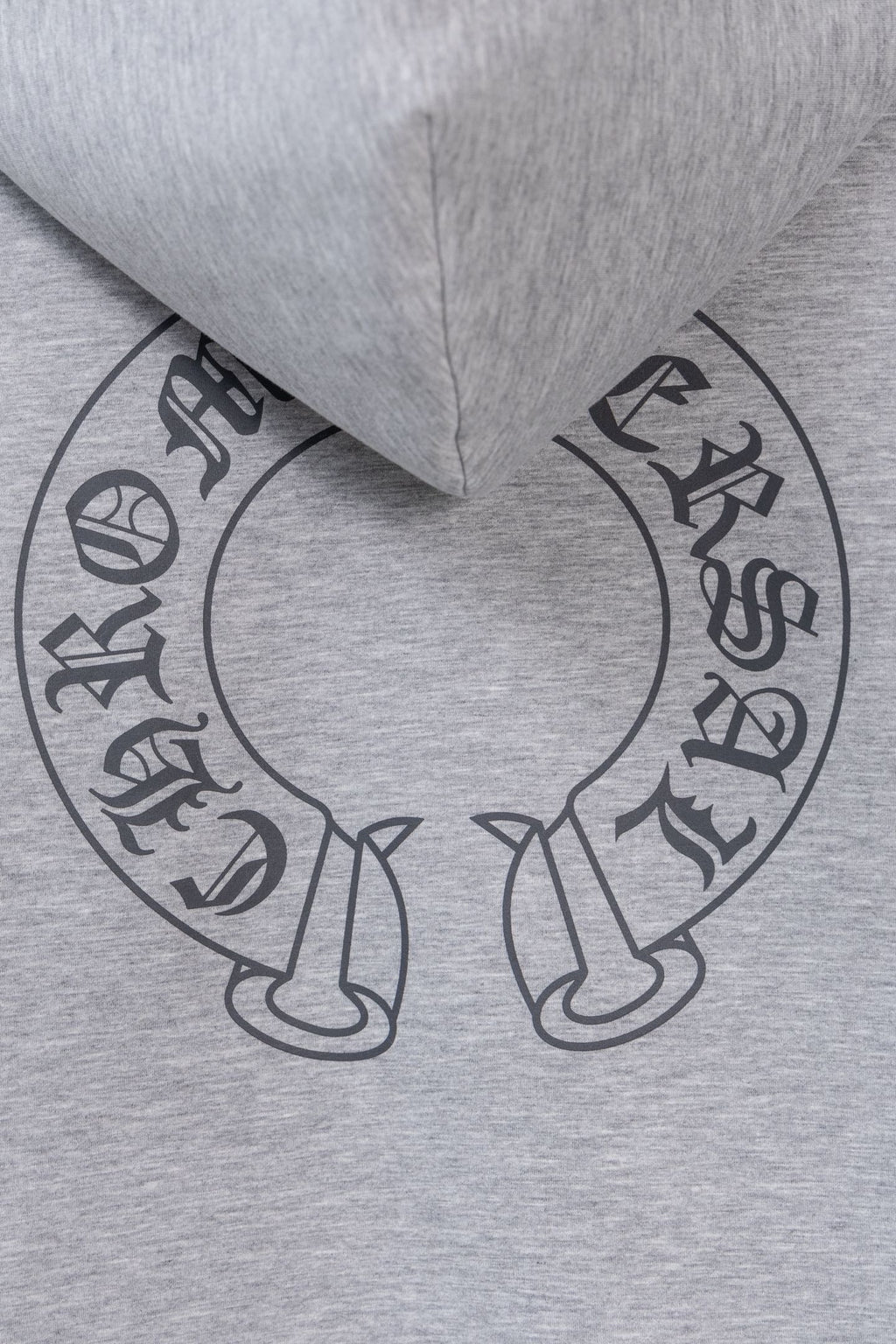 Heather gray zip-up hoodie neck area with circular graphic