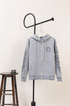 Grey long-sleeve zip hoodie with hood, front pockets, and graphic sleeve print.