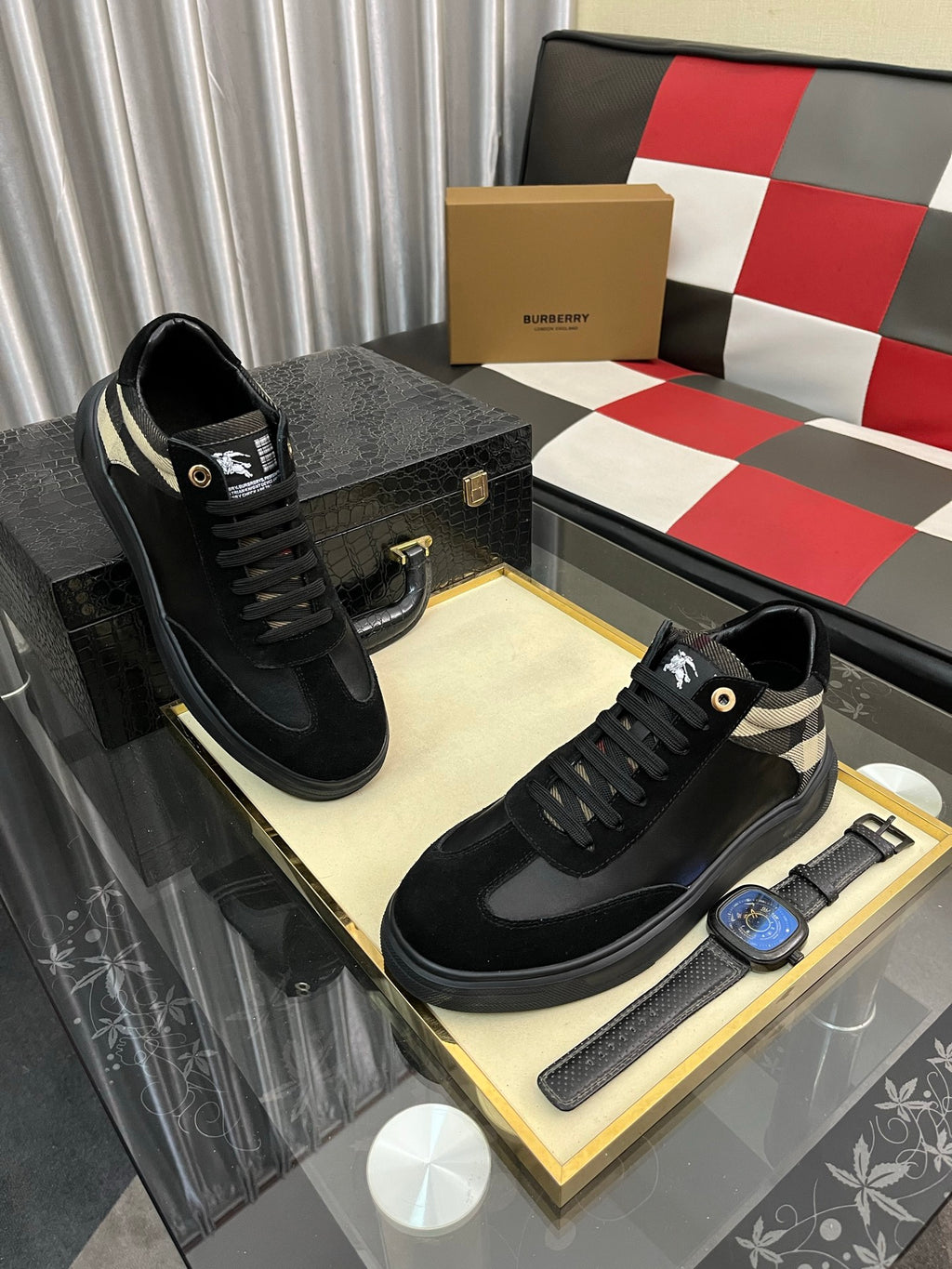 Black lace-up low-top sneaker with beige-and-black check collar detail
