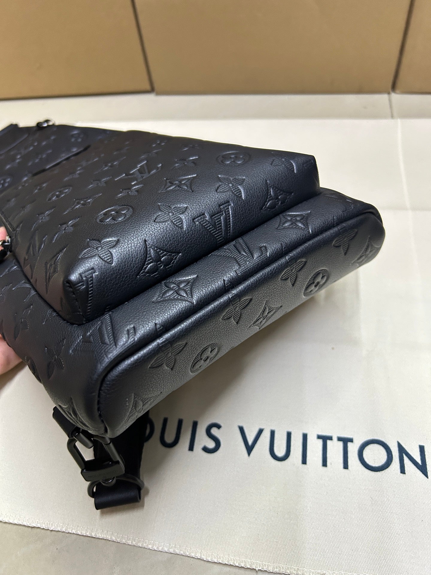 Men's Louis Vuitton monogram leather bag, dark blue/black, folded/rolled top detail