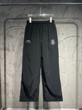 Black Balenciaga wide-leg pants with elastic waistband and embroidered side logos