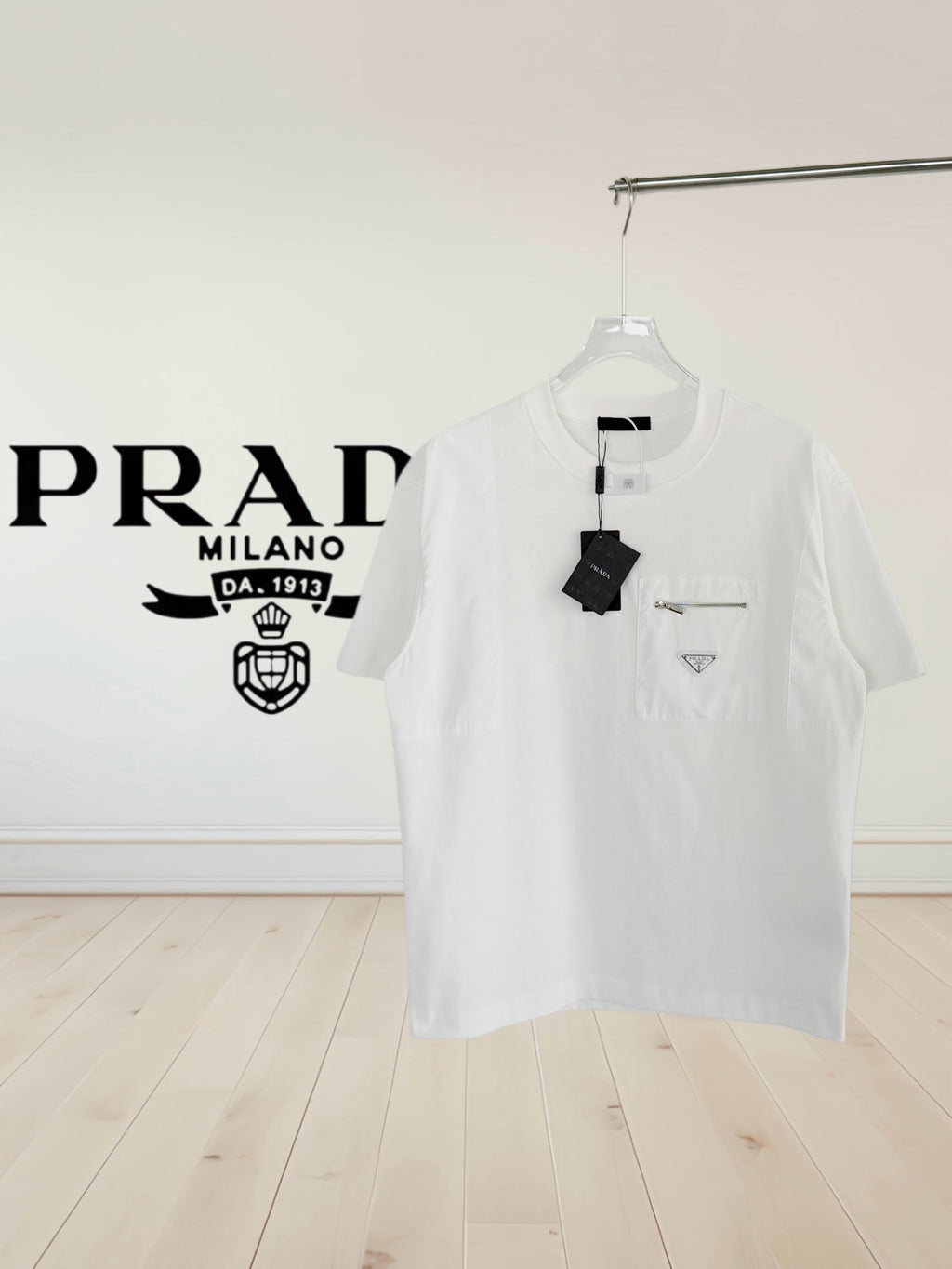 White short-sleeve T-shirt with chest pocket and Prada logo patch
