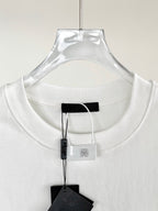 White crewneck T-shirt collar with black inner label and hanging tag