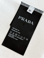 Prada T-shirt care label with washing and composition instructions