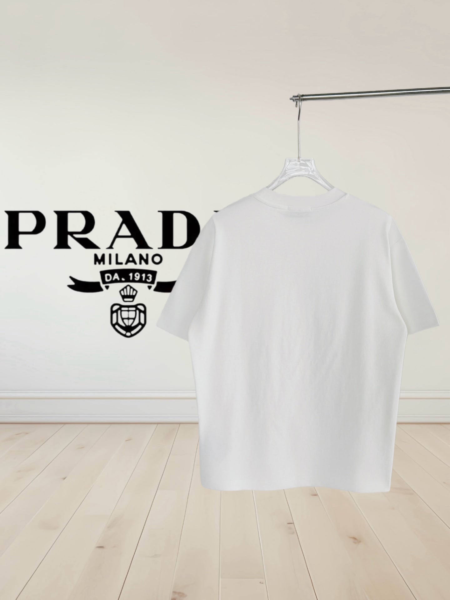 White short-sleeve crewneck T-shirt, back view on hanger