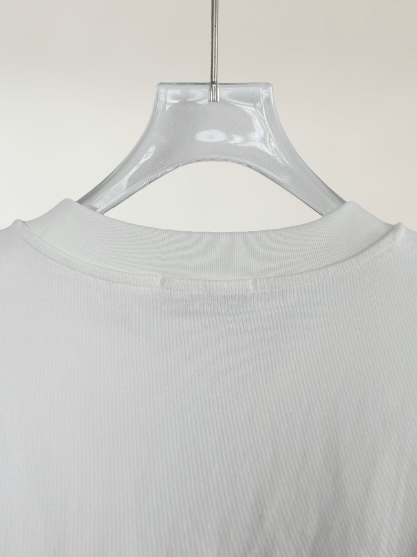 White T-shirt crewneck neckline close-up