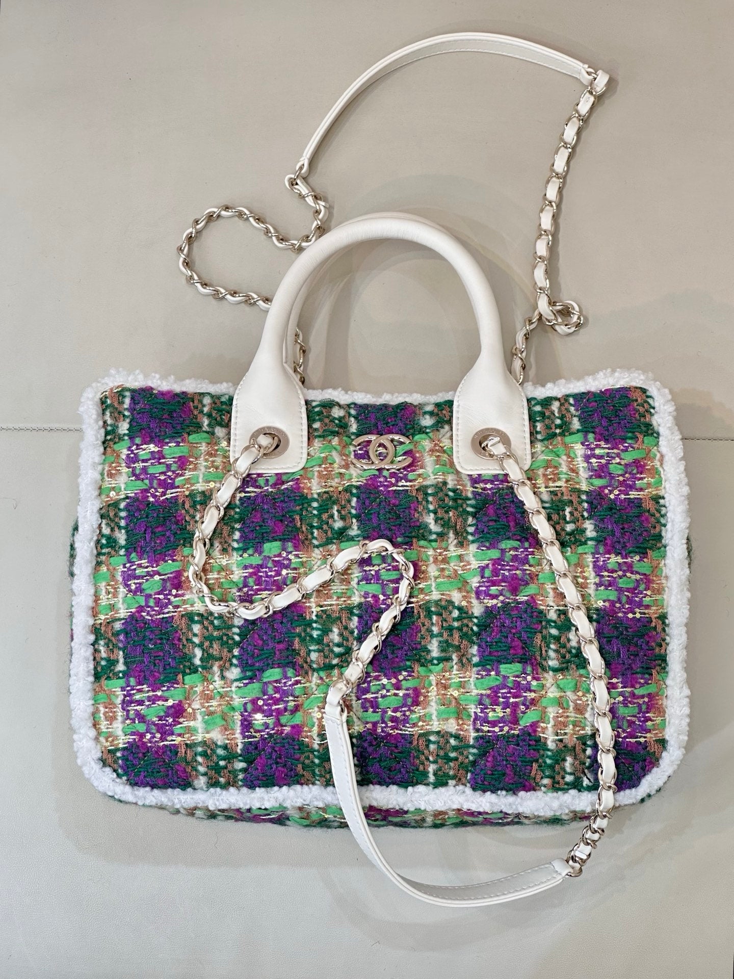 Chanel tweed handbag with white top handles, multicolor sequin-like weave, chain straps