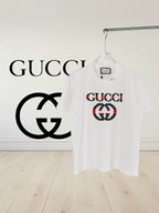 White crew-neck T-shirt with multicolor Gucci logo chest print