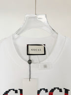 White T-shirt neckline with Gucci label and small hanging detail tag