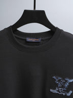 Black crewneck short-sleeve T-shirt with inner neckline logo tag and graphic