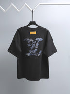 Black graphic T-shirt with short sleeves and crew neck