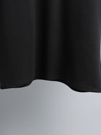 Black short-sleeve T-shirt lower hem view