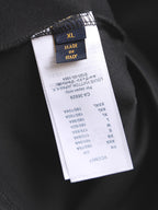 Black T-shirt size label showing XL and "Made in Italy"