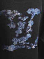 Black short-sleeve T-shirt with large blue graphic print on chest