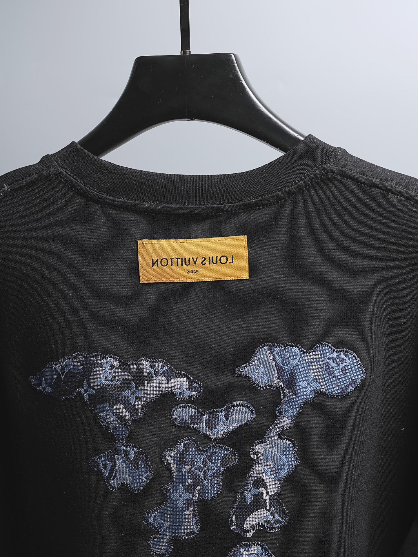 Louis Vuitton black crewneck T-shirt with neck label and blue graphic