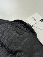 Dior long puffer jacket, dark navy, hood and Dior logo patch on monogram fabric