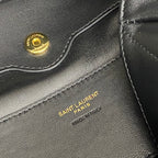 “SAINT LAURENT PARIS” stamped on black YSL leather near logo hardware