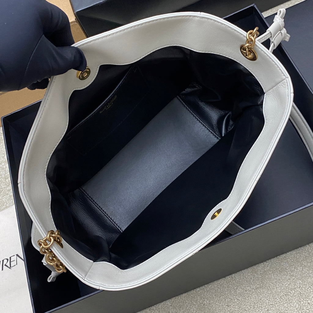 YSL bag open top showing dark lined interior and interior pocket