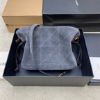 Suede YSL shoulder bag in blue-gray with YSL logo and adjustable strap