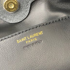 Gold SAINT LAURENT PARIS branding on gray leather bag panel