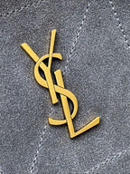Gold YSL monogram on blue-gray suede bag