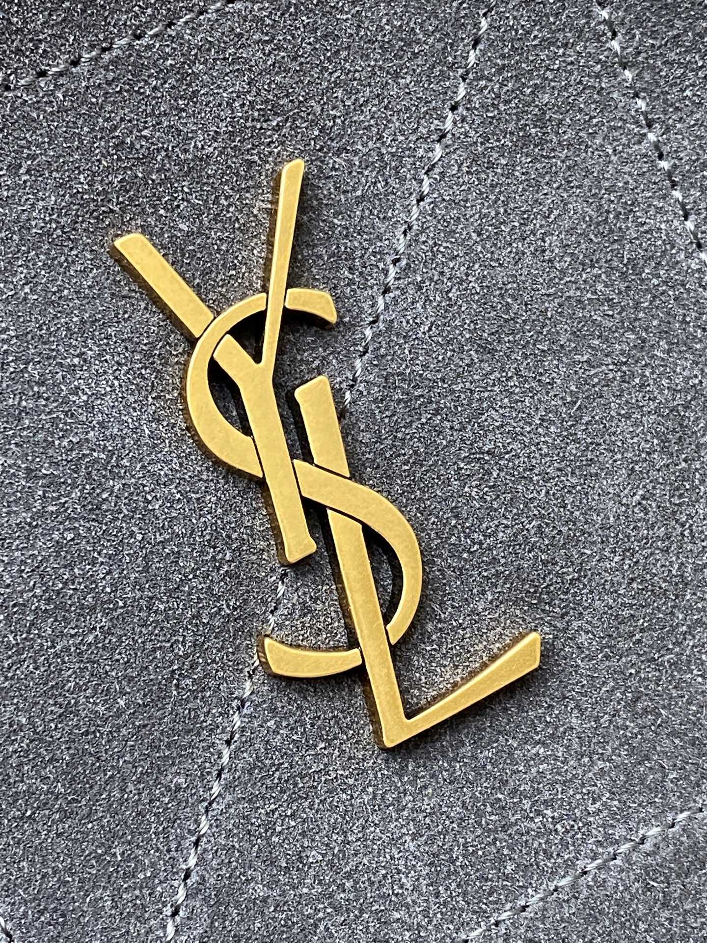 Gold YSL monogram on blue-gray suede bag