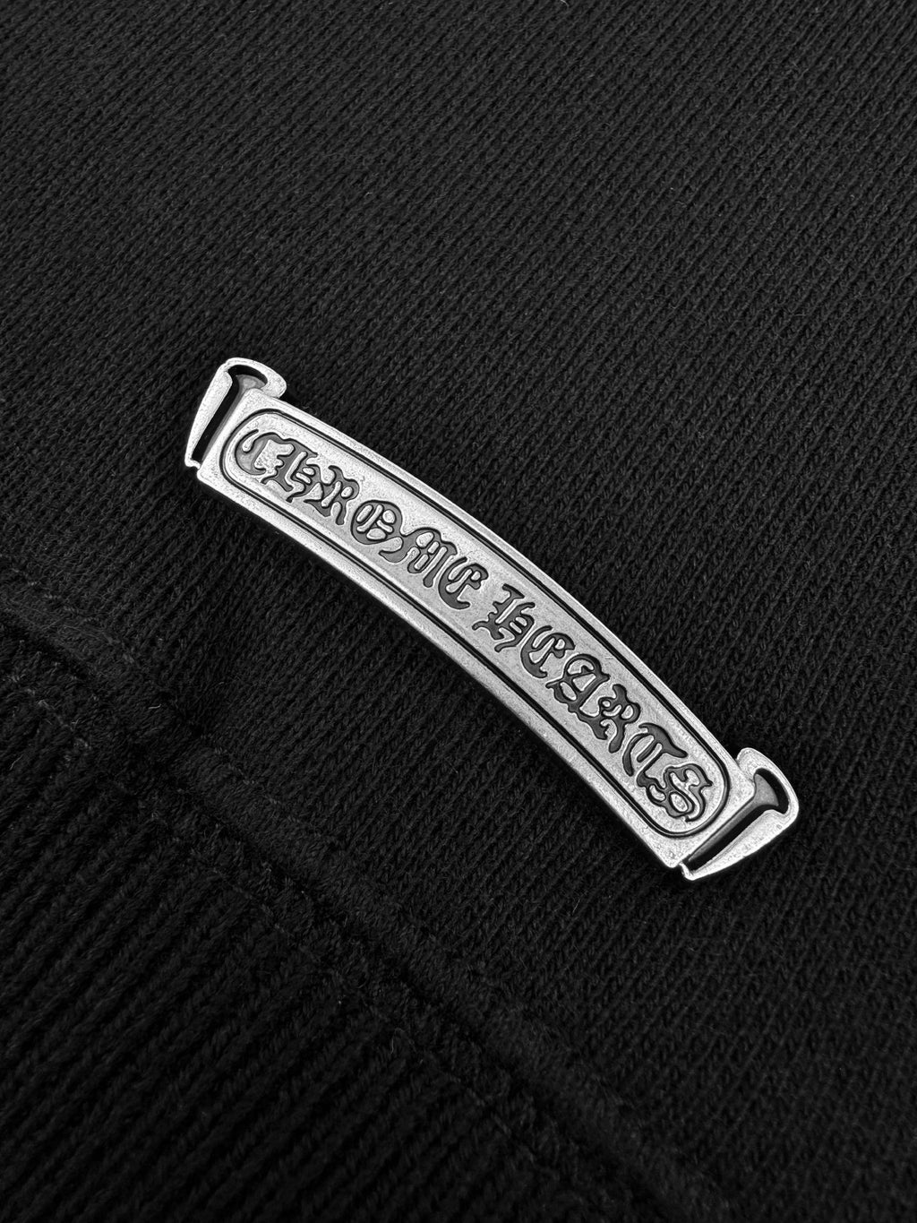 Black hoodie with Chrome Hearts woven neck label