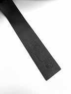 Black leather label strap with embossed Chrome Hearts logo