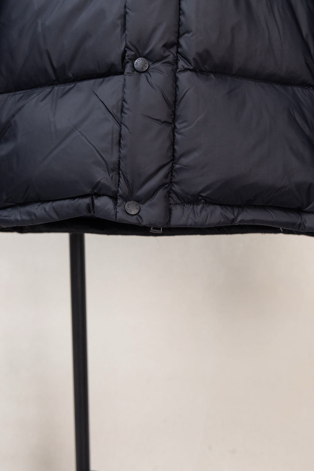 Moncler padded puffer jacket upper front with button placket and quilted panels