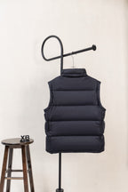Moncler dark padded puffer vest with high collar and stitched horizontal quilting