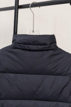 Moncler dark puffer jacket with stand collar and quilted front