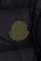 Moncler logo patch on dark navy puffer jacket