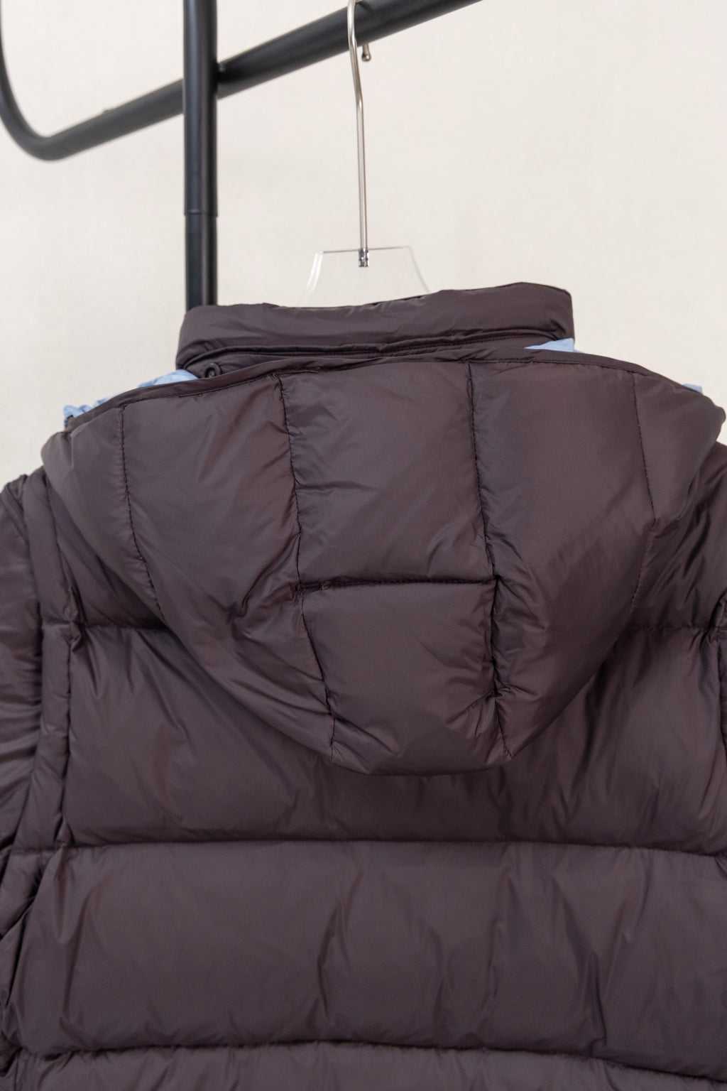 Moncler hooded puffer jacket back view with elastic hood detail, dark navy