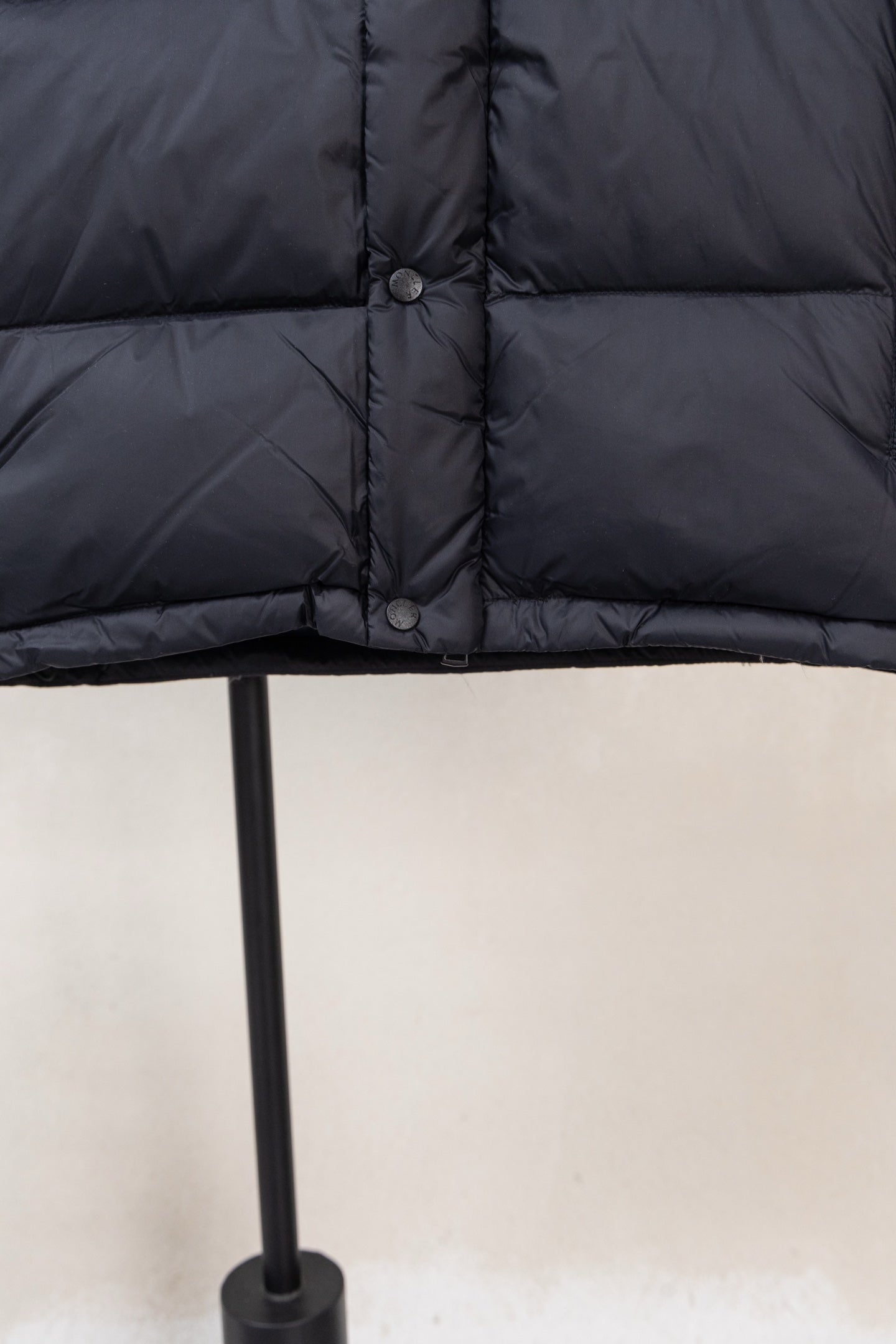 Moncler padded puffer jacket, dark with button front and stitched panels