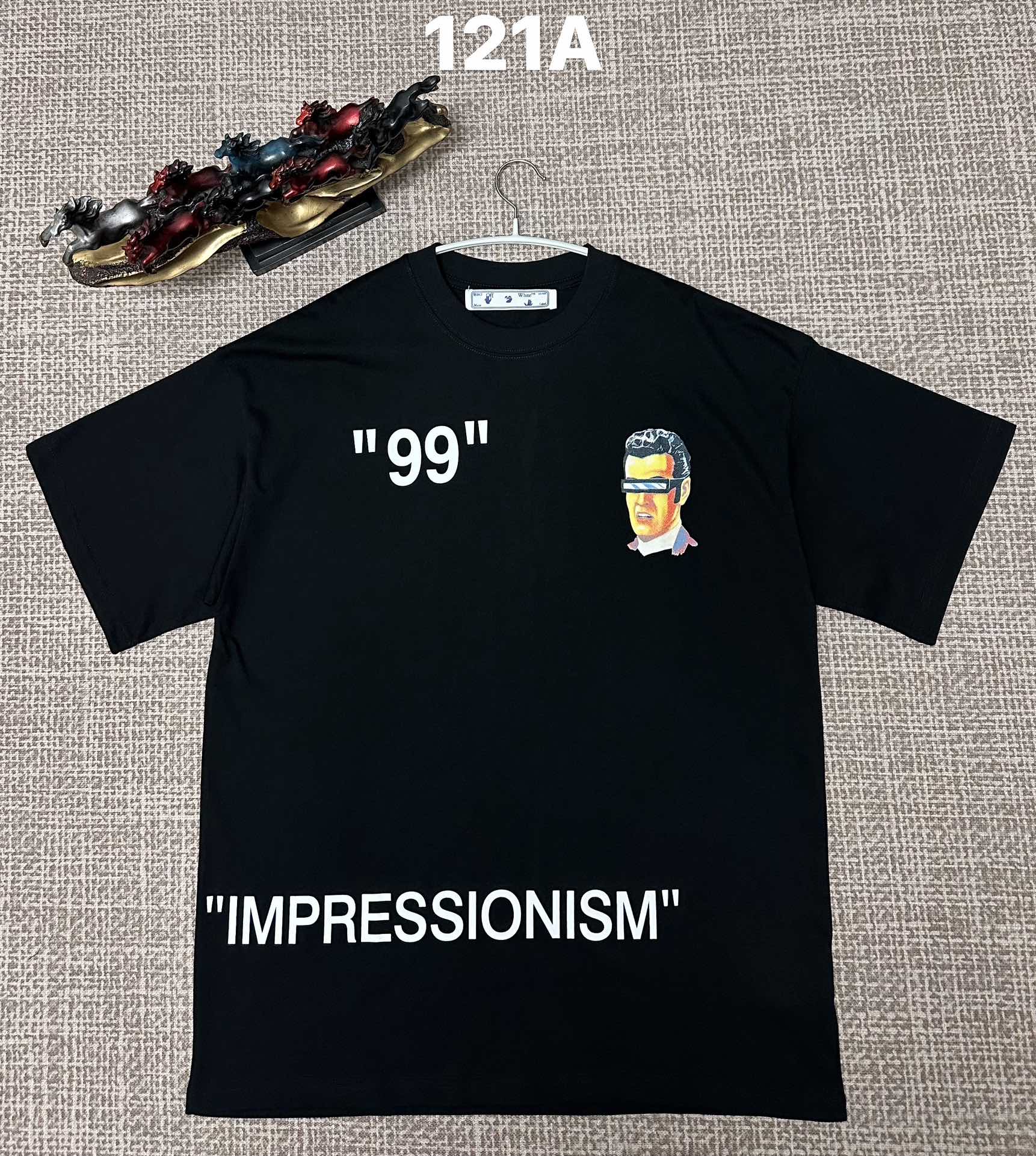 Off White graphic T-shirt, black with '99' and face artwork