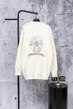 White cardigan sweater with large back graphic and button placket