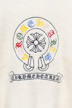 White long-sleeve T-shirt with round crest graphic and Chrome Hearts banner