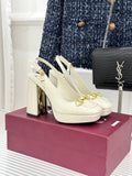 Cream leather heeled loafers with gold chain detail and chunky block heel