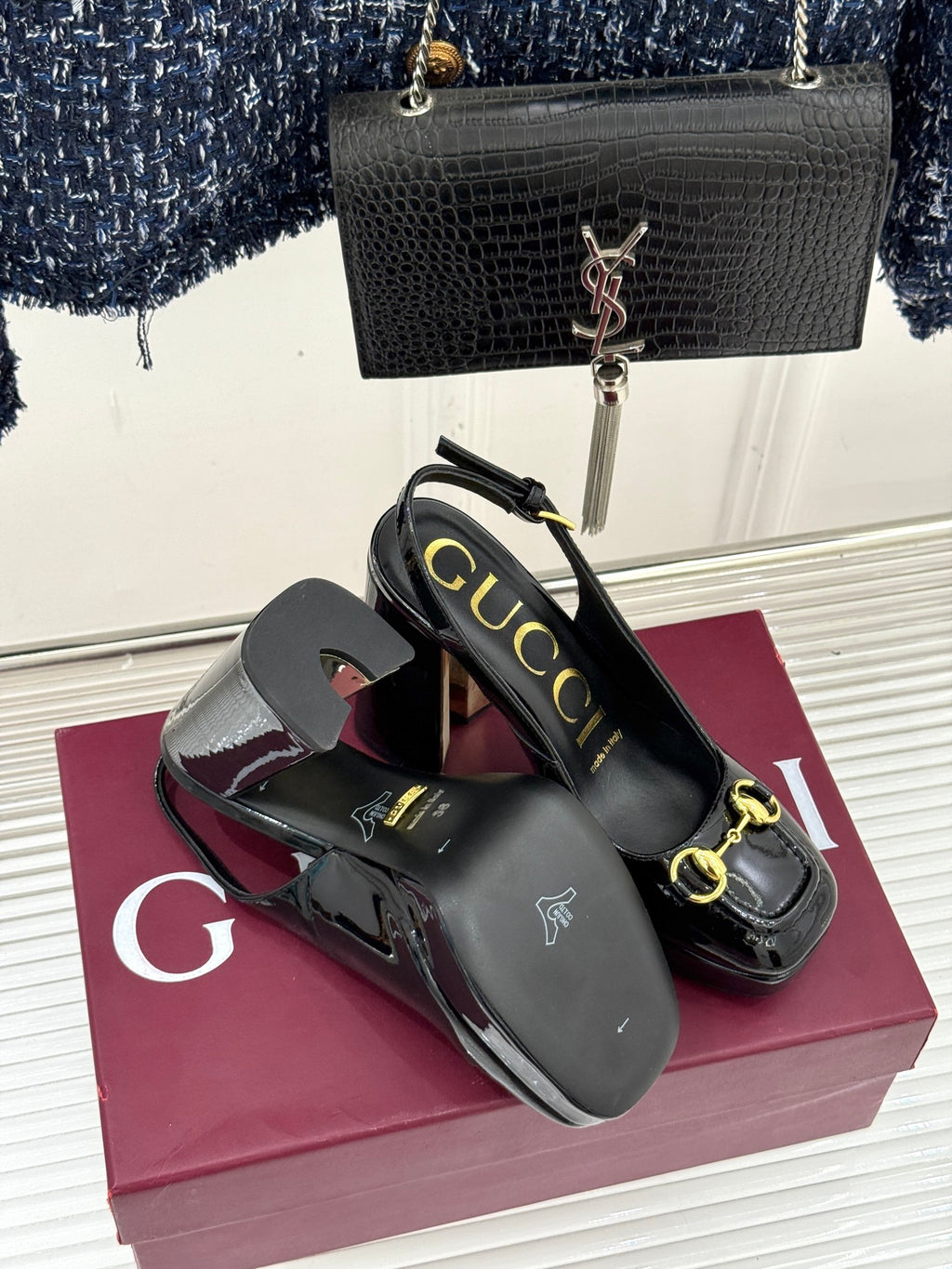 Gucci ladies black patent heeled shoes with gold horsebit trim and slingback straps