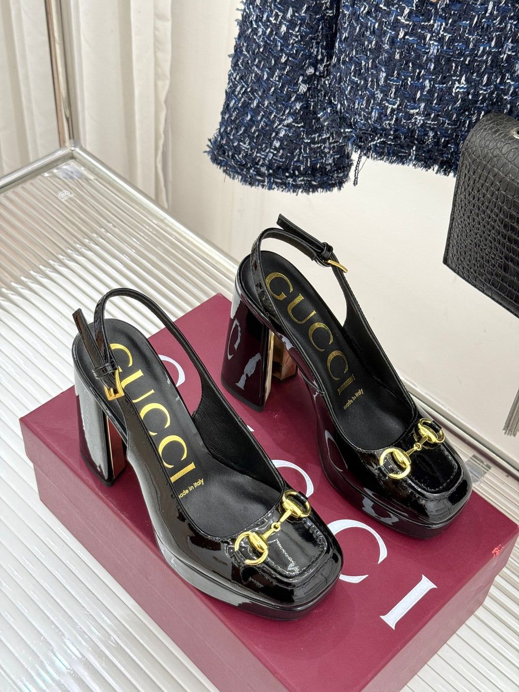 Gucci black patent platform heeled shoes with gold horsebit trim and sling heel straps