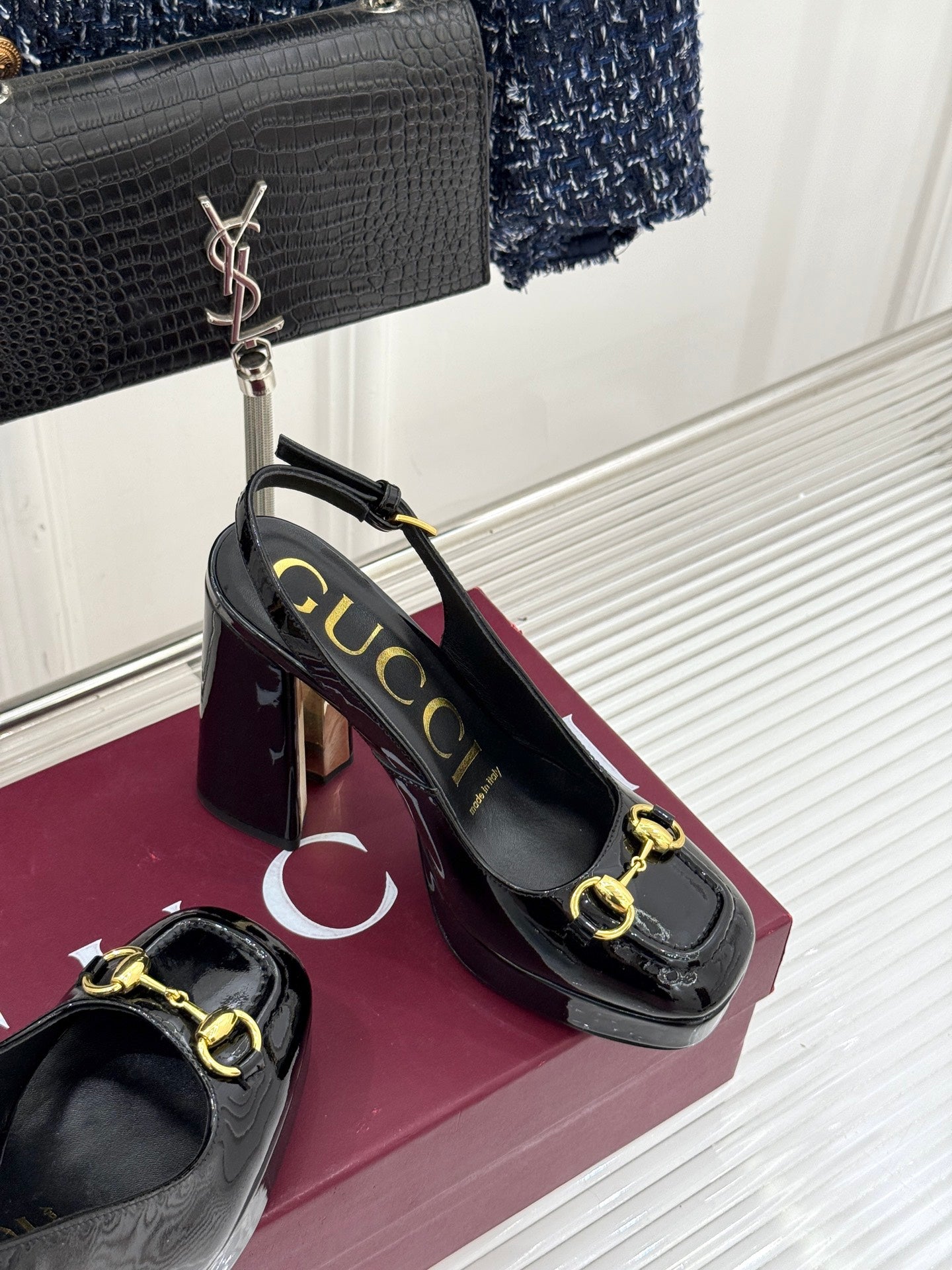 Gucci black patent heeled shoes with gold horsebit trim and chunky glossy heel