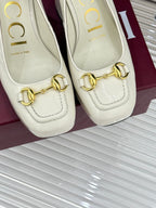 Gucci white leather loafers with gold horsebit trim, stitched front detail